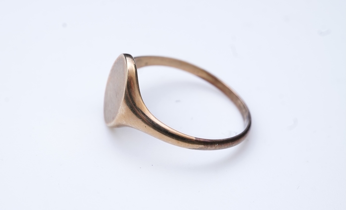 Four brooches and a gold signet ring